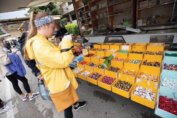 A student shops in a Tuscan market