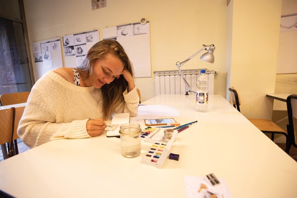 A student at work at her desk