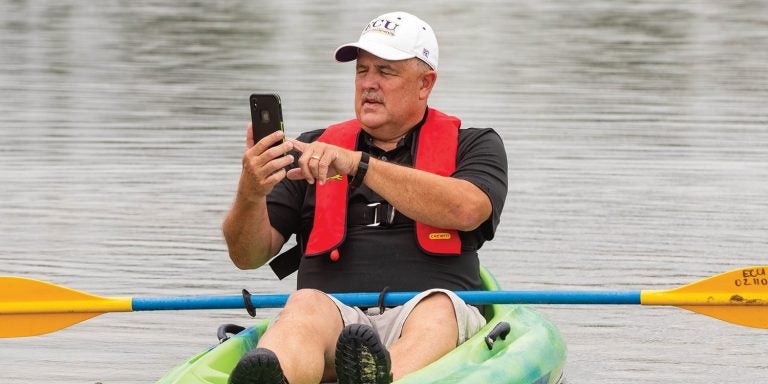 ECU professor Ernie
Marshburn has
developed a new
approach to boating
safety using an app
on boaters’ phones.