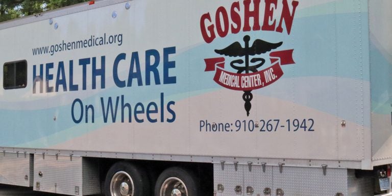 Above, the Goshen Medical Center mobile van was on display at a GWEP health screening in Varnamtown. The van provides medical care to rural residents who struggle receiving traditional health care services. Photo by Matt Smith.