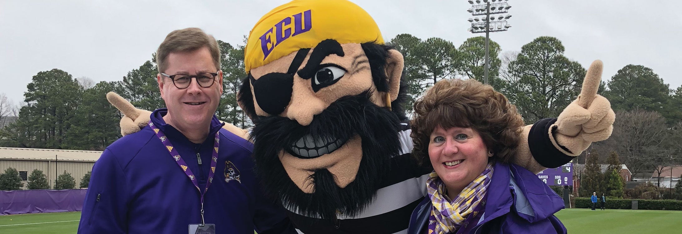 Immediate past chancellor Staton with his wife and PeeDee the pirate.