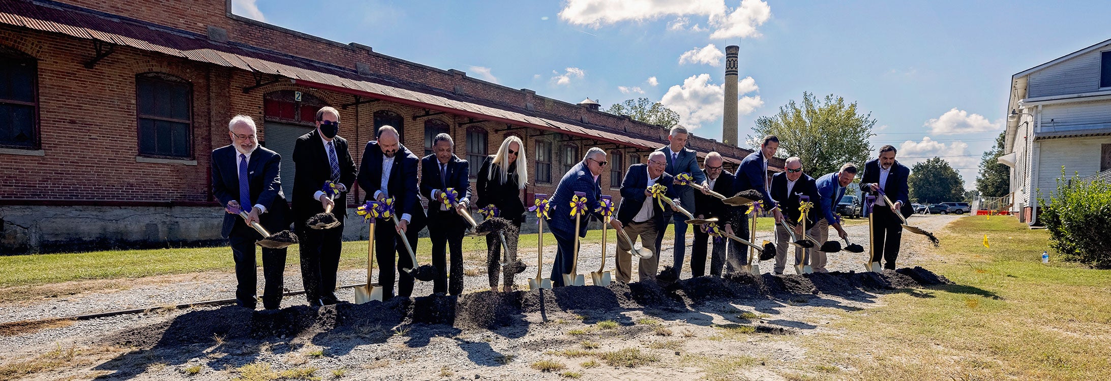 Officials with ECU, Elliott Sidewalk Communities and the city of Greenville break ground on the first phase of Intersect East.