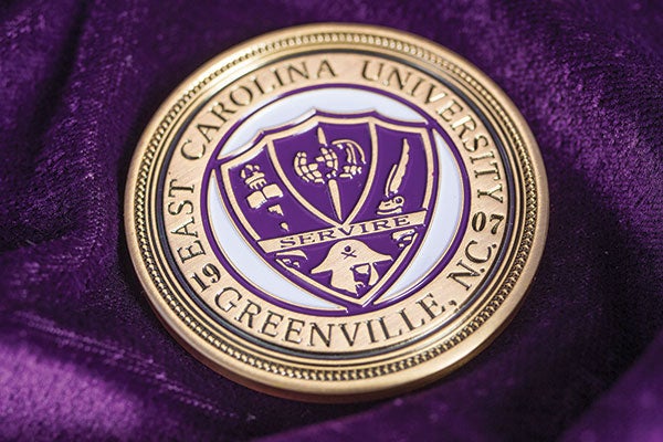 A medal that states EAST CAROLINA UNIVERSITY