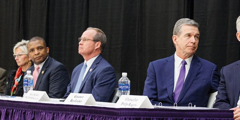 From left, Dr. Sy Saeed of ECU, Anita Bachmann of UnitedHealthcare Community Plan of North Carolina, U.S. Rep. Don Davis, U.S. Rep. Greg Murphy, Gov. Roy Cooper and ECU Chancellor Philip Rogers were at ECU for the Feb. 14 announcement.