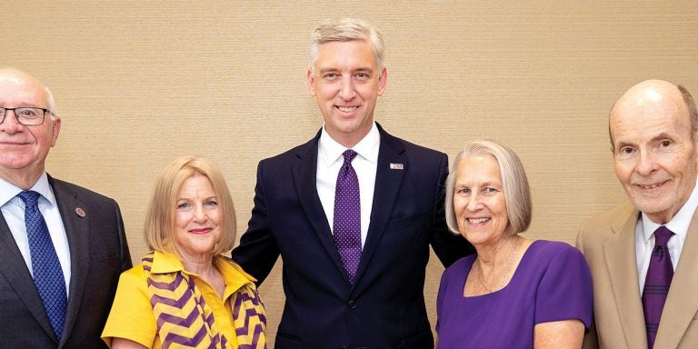 Robert and Amy Brinkley, left, and Lynn and Pat Lane, right, were honored by Chancellor Philip Rogers for their historic commitment to ECU.