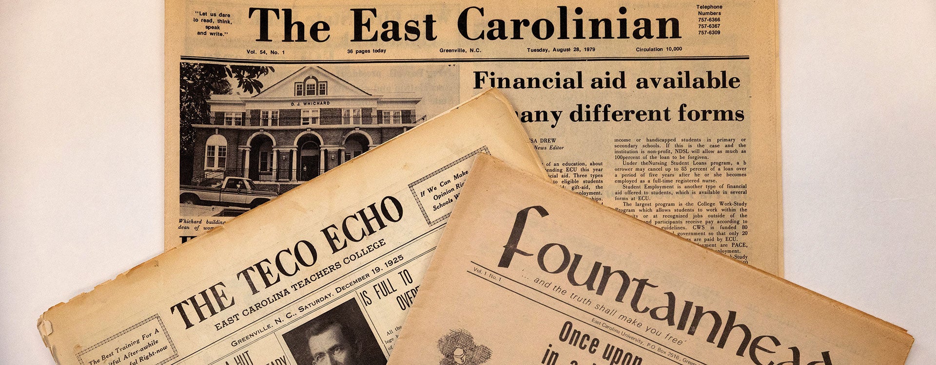 three old newspapers